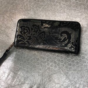 Arts Eye zip around wallet. Excellent condition. Silver and black leather.